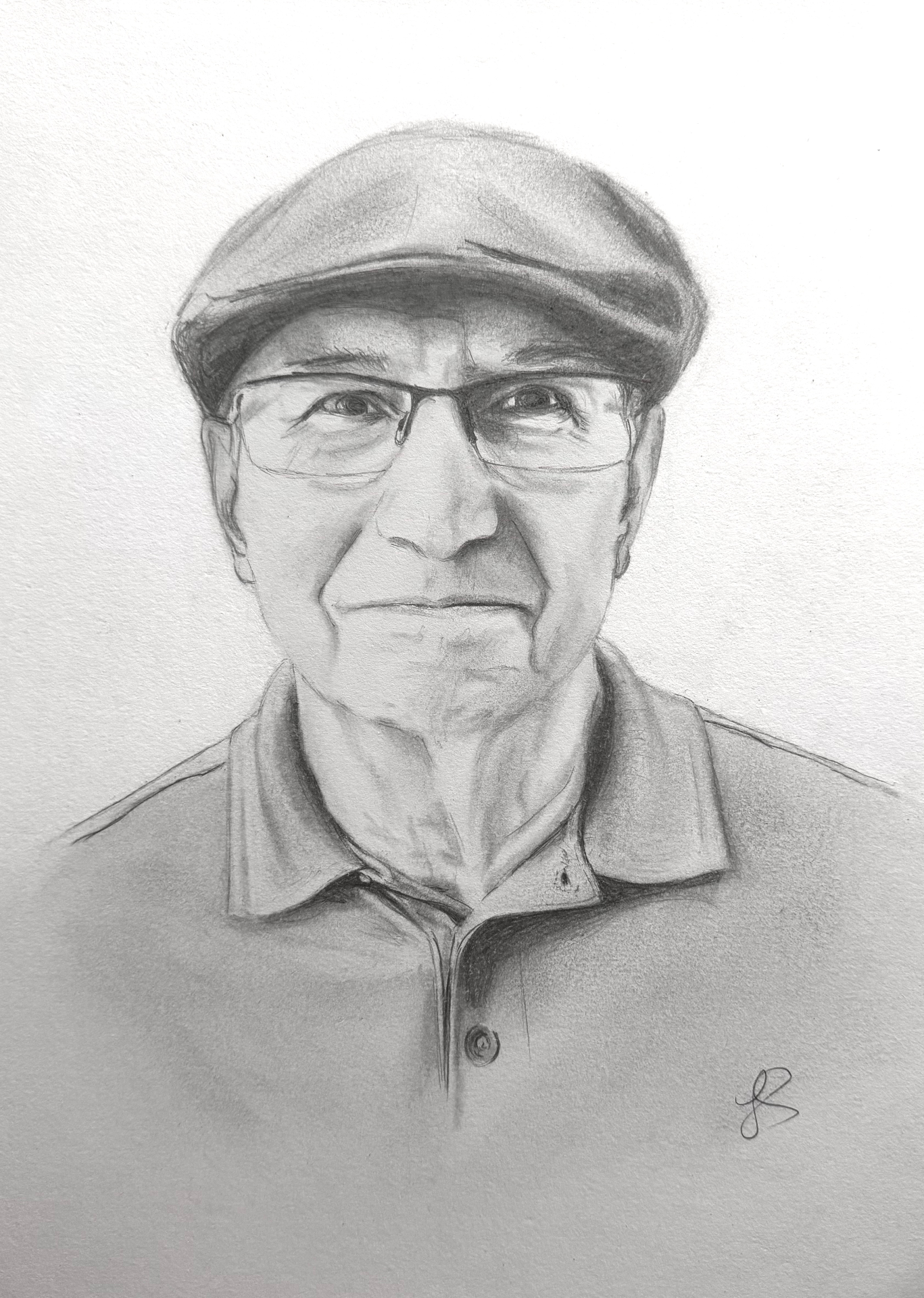 Portrait of an older man with glasses and a flat cap